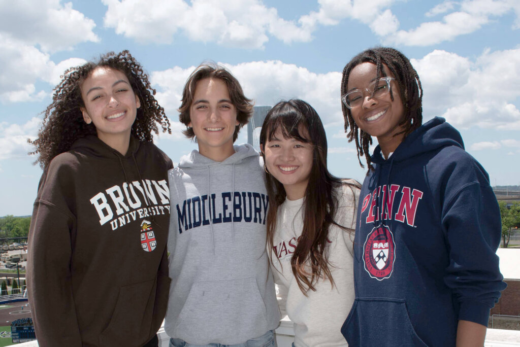 Students wearing their college shirts