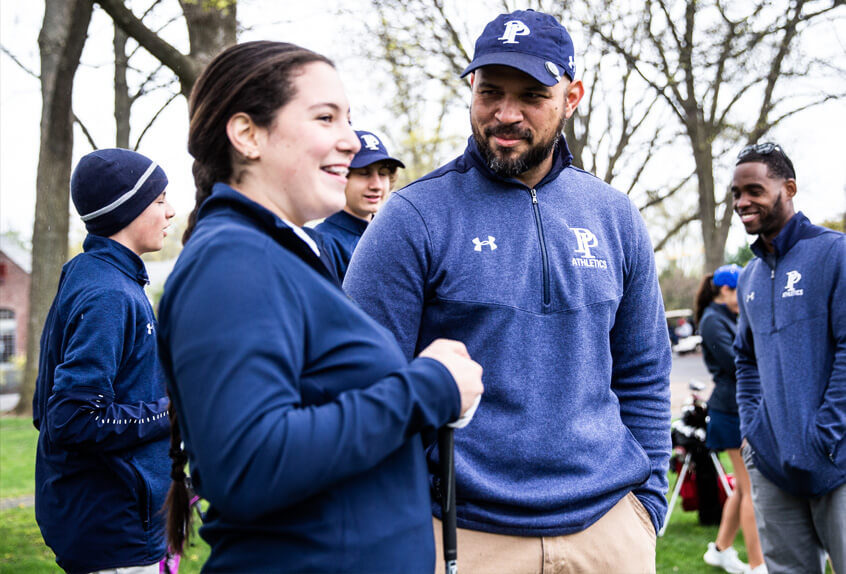 Poly Prep Golf team Athlete talks with the Coach