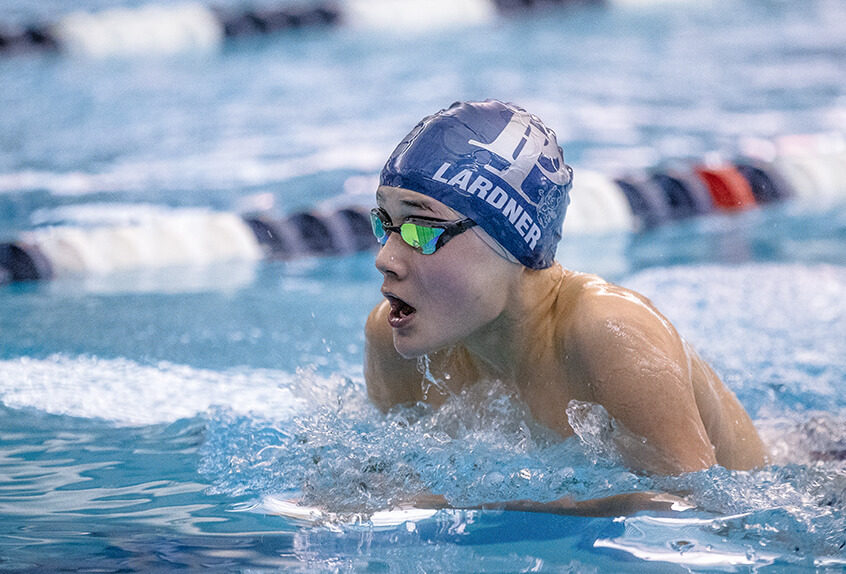 Boys swimmer racing