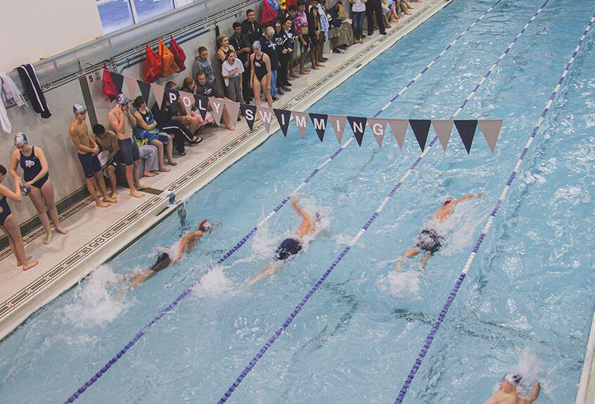 Boy swimmer racing