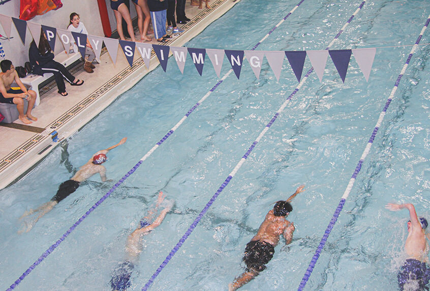 Boy swimmer racing