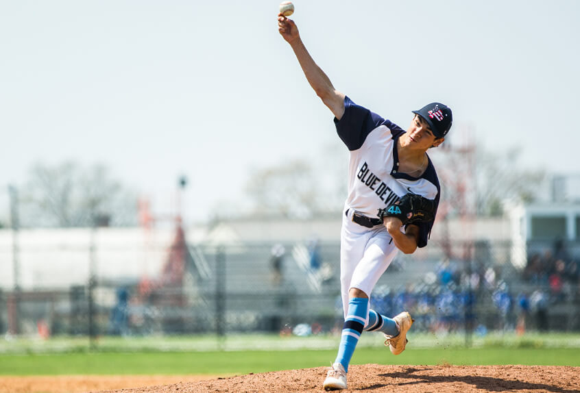 Poly Prep Baseball pitcher throwing the ball