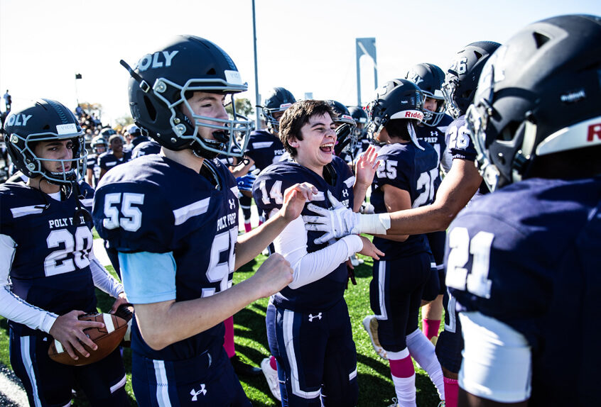 Poly Prep Football team cheering after a win