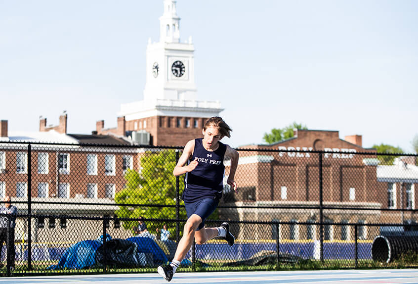 Track and field boy running