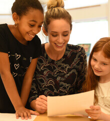 Lower school teacher with students