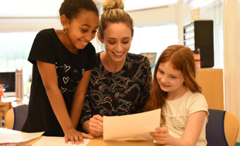 Lower school teacher with students