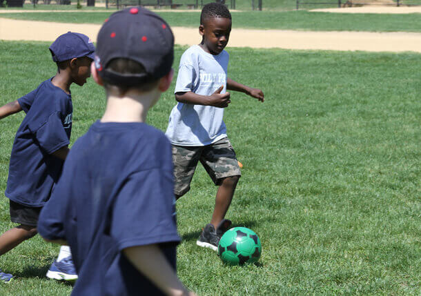 Poly Prep Lower School students playing soccer