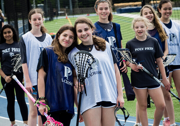 Poly Prep Middle Schoolers learning to play lacrosse