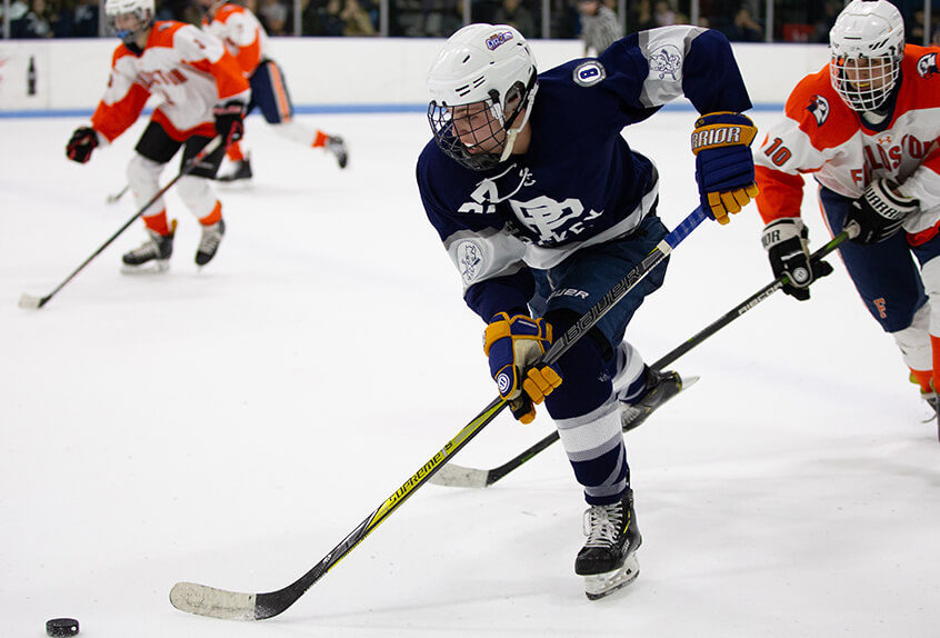 Poly Prep students playing hockey