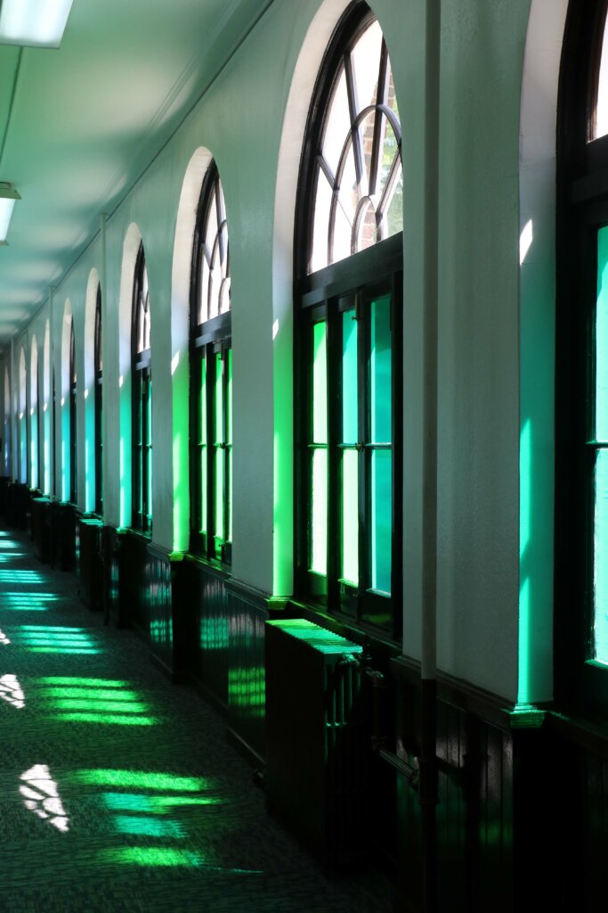 Sarah E. Brook blue green hallway