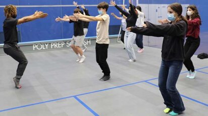 Dancer and choreographer Winston Dynamite Brown instructs students