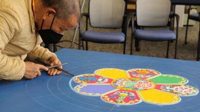 Lama Tenzin creating mandala 2022