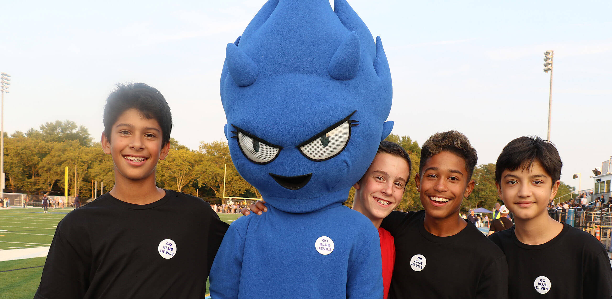 Boys with Blue Devil mascot
