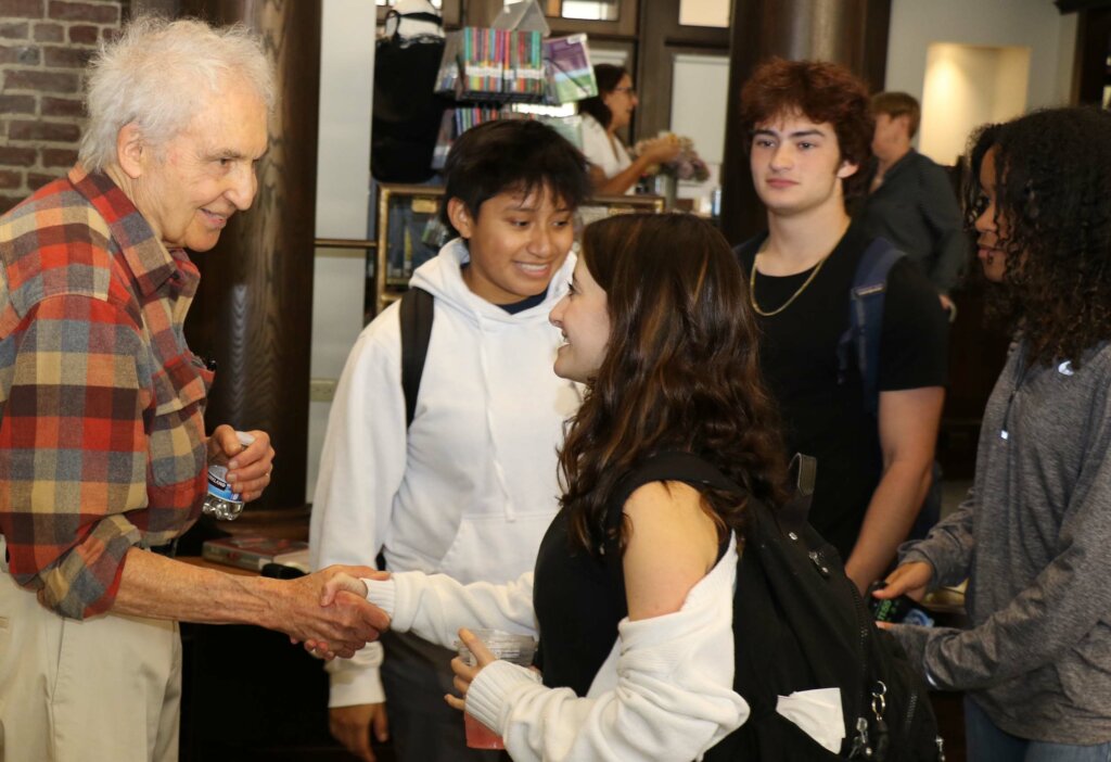 Joseph McElroy ’47 with students