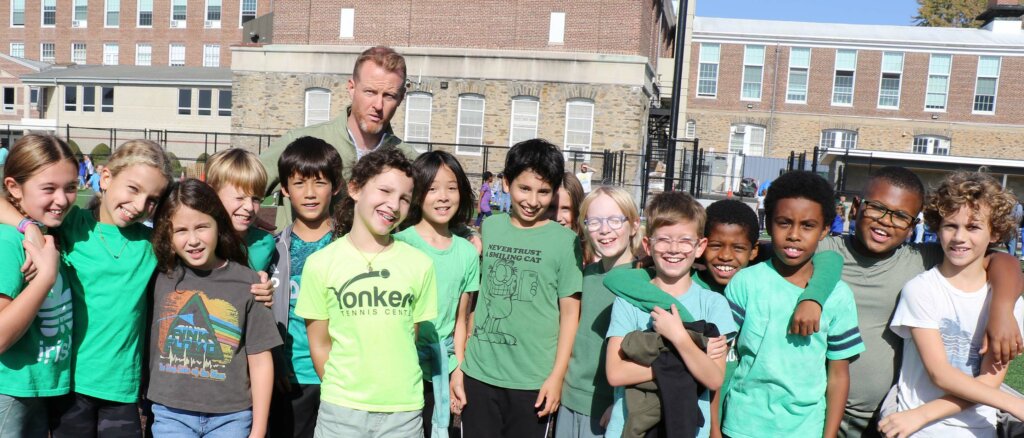 Students dressed in green for solidarity event