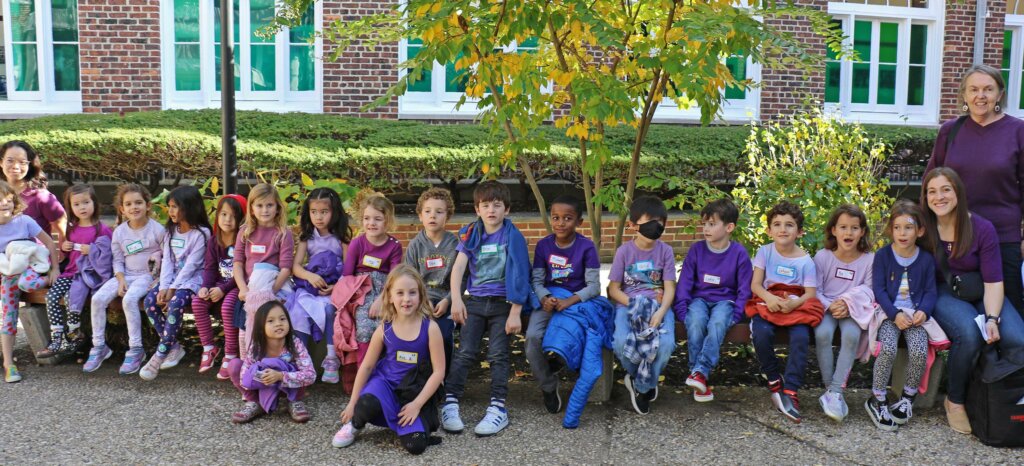 Students dressed in violet for solidarity event