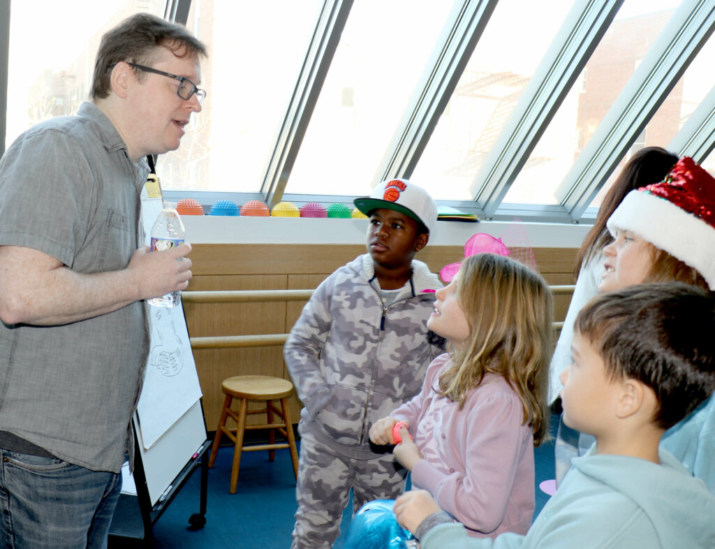 John Patrick Green with students