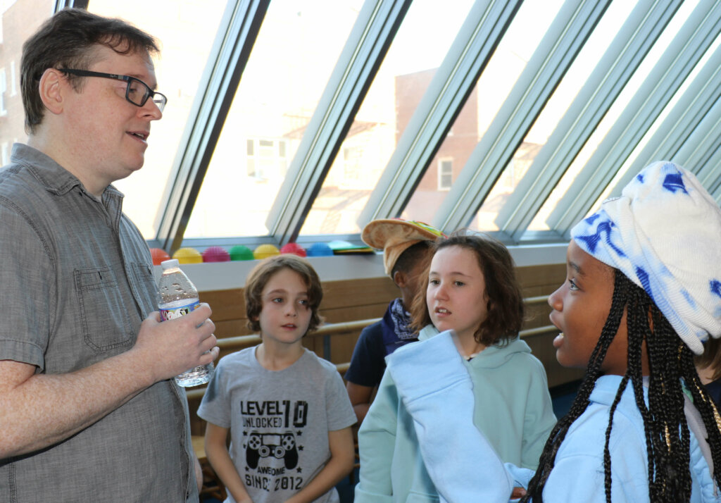 John Patrick Green with students