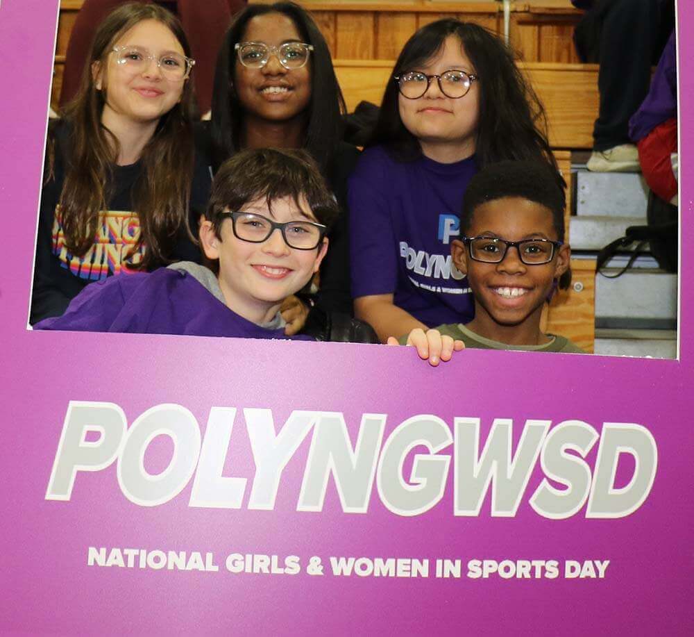 Middle School kids celebrating National Girls and Women in Sports Day.