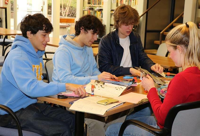 Students work on mood board project during visit by Camryn Garrett