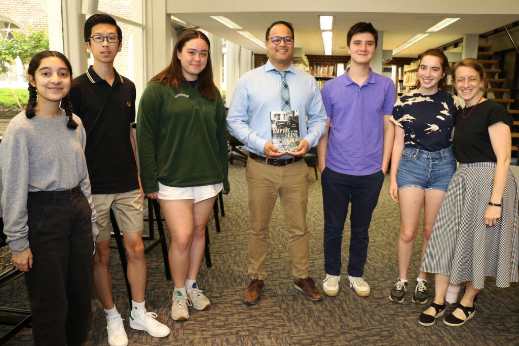  Dr. Amit Prakash with members of Poly's History Club and Dr. Virginia Dillon