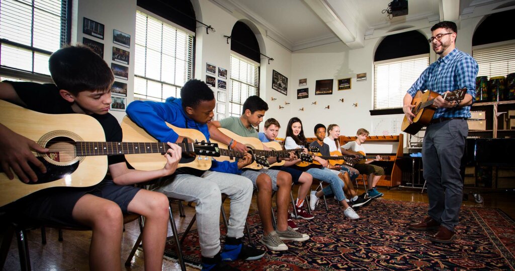 Dan Doughty teaches guitar