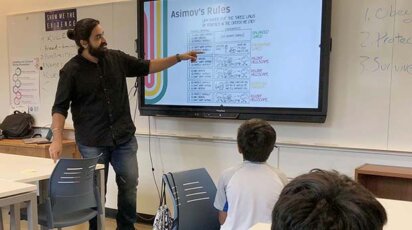 NYU Summer Courses teacher with students