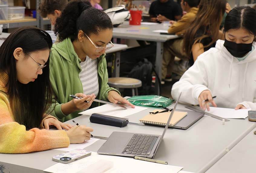 Students focus in Graphic Novels class