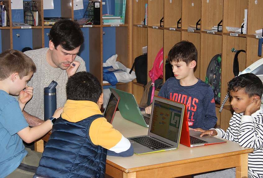 Lower School After School play - children with computers