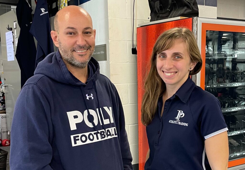 Athletic trainers John Pomponio and Alyssa Alaimo