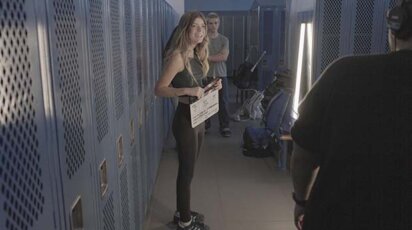 Sadie Schoenberger '25 on set in locker room