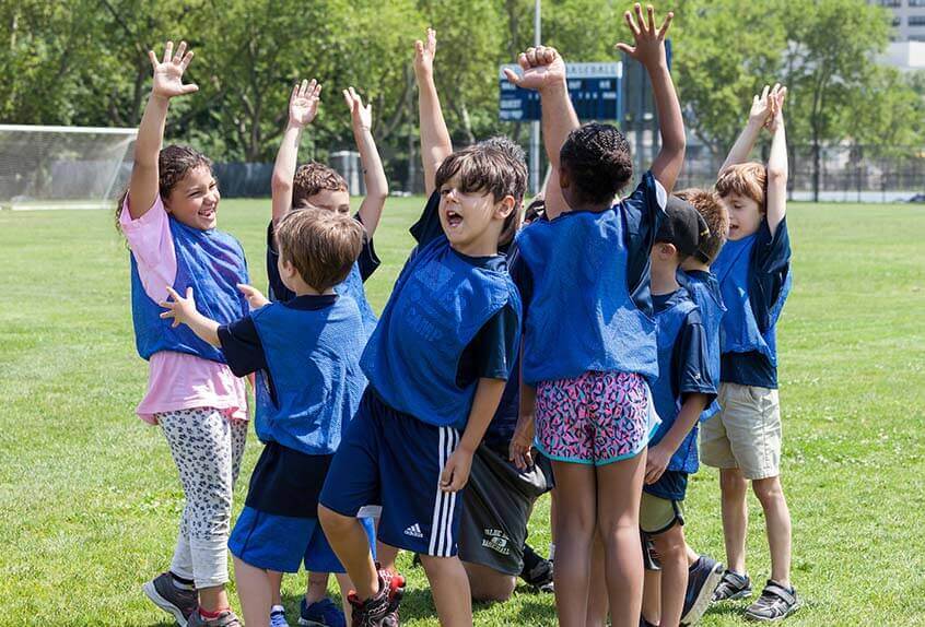 Children cheering at Poly Summer day camp