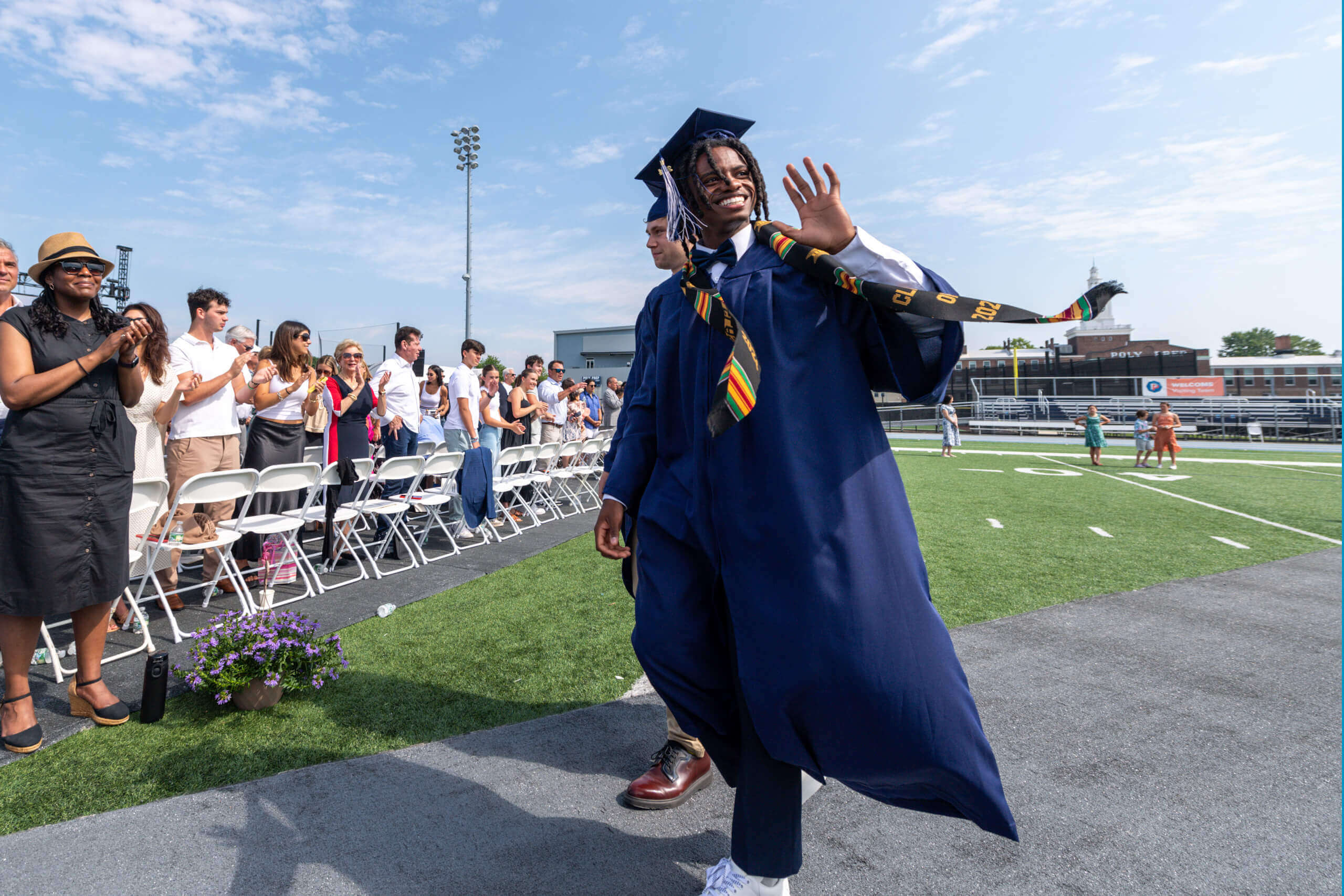 Commencement students process