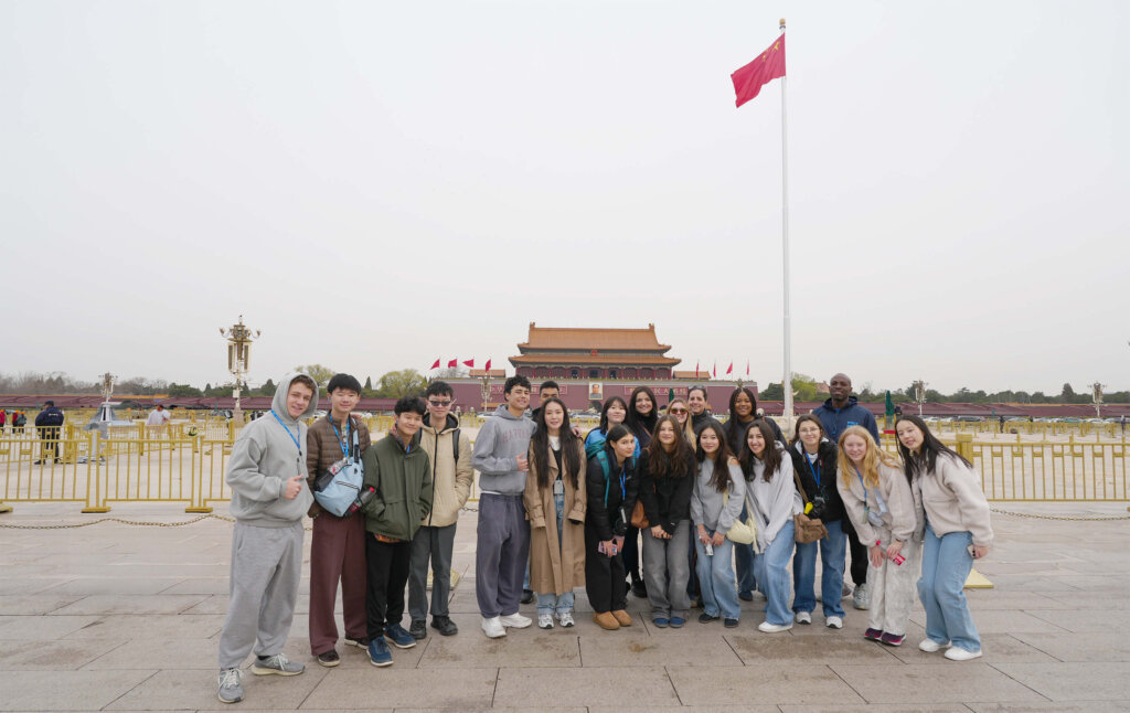 Poly group in front of the The Forbidden City, aka the Palace Museum, in Beijing, China.