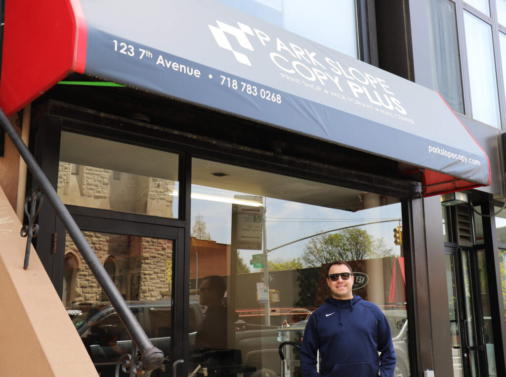 Jon Kalb '08 outside his business Park Slope Copy