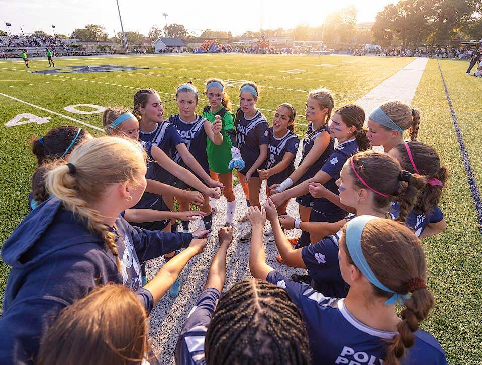 Girls soccer huddle