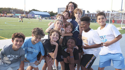 Noni Thomas López with Middle School students on Blue Devil Night
